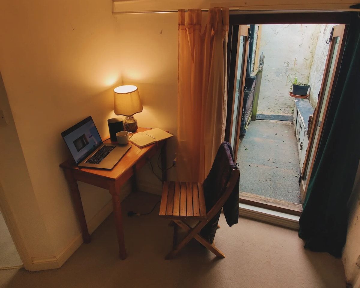 A desk nook opening onto the courtyard