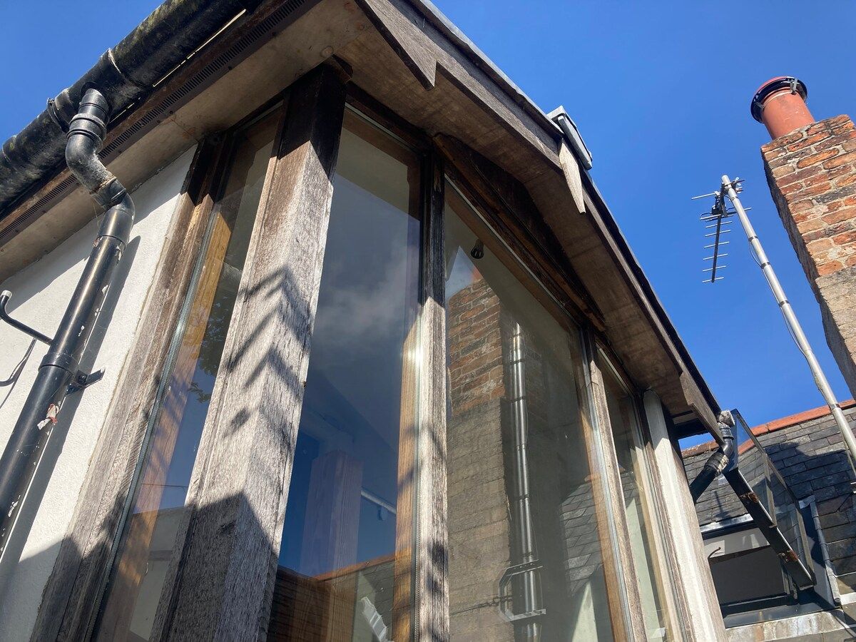 The cottage gable and its glazed window