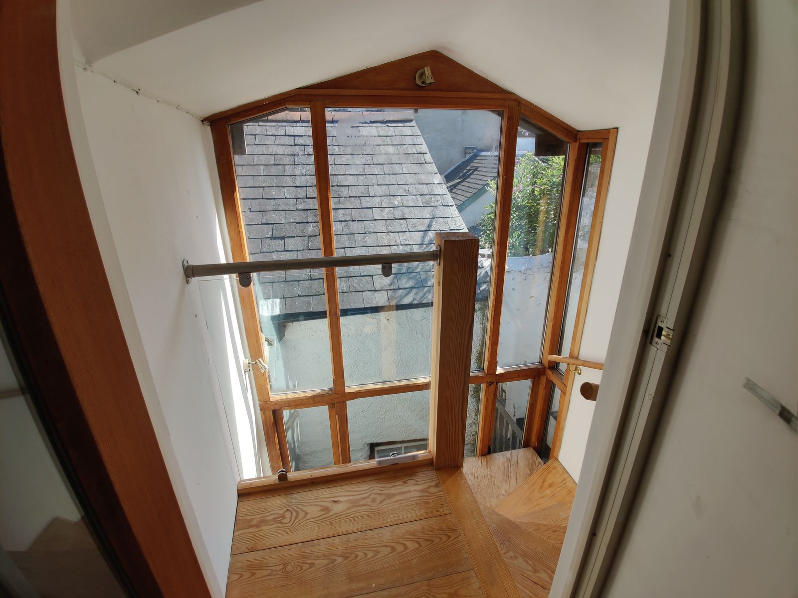 The master gable window looking over the rooftops