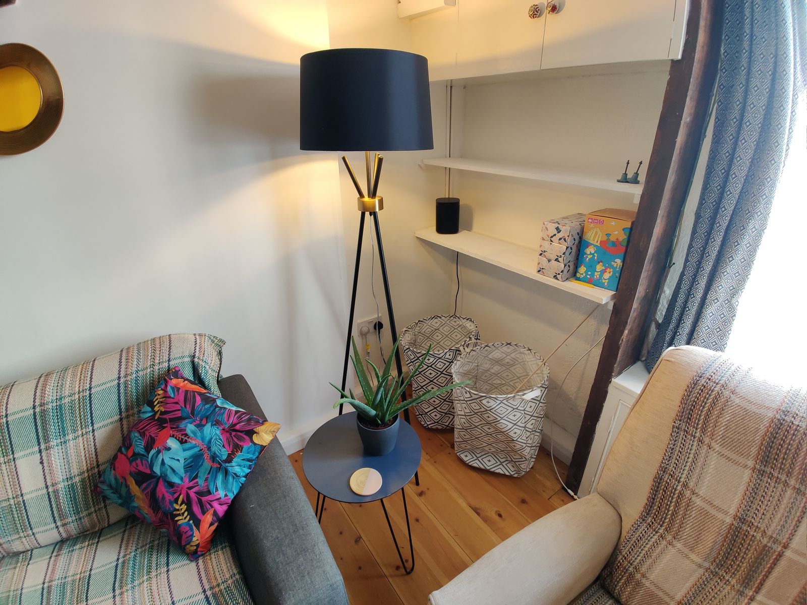 A quiet reading corner with a floor lamp